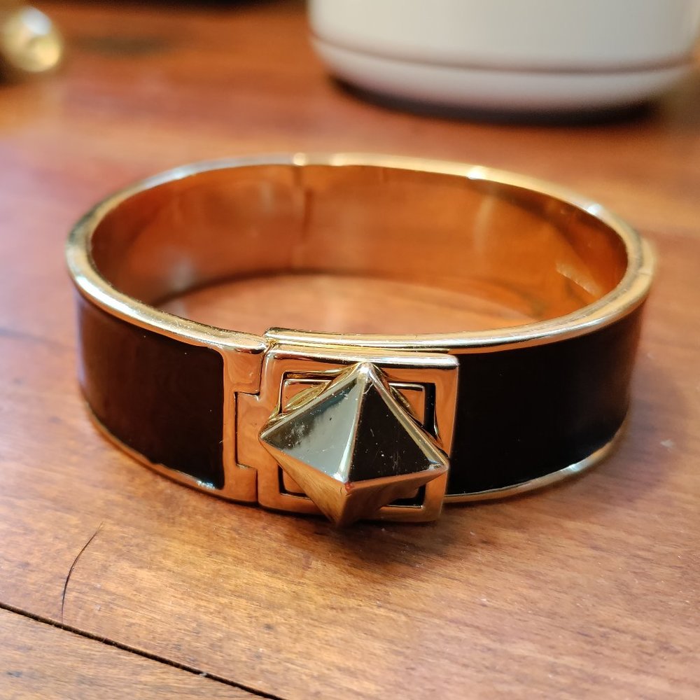 Kate Spade black enamel bracelet with locked-in closure